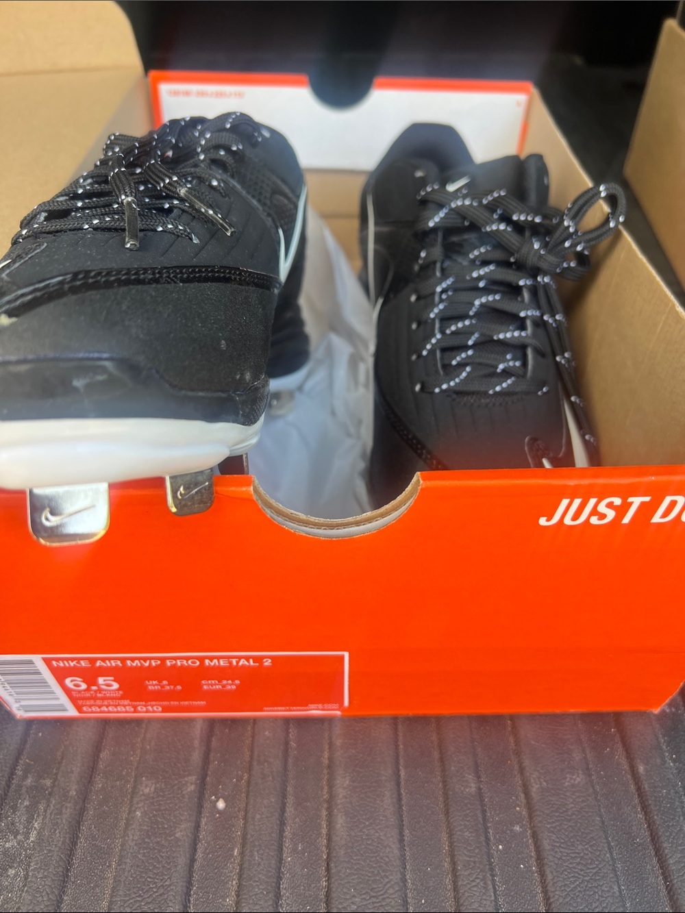 Nike Black Baseball Cleats with White Accents Women's